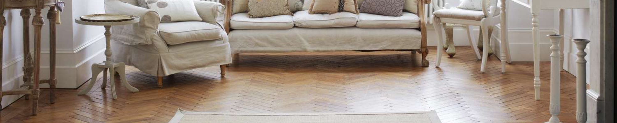 living room with wood-look luxury vinyl flooring from Carpet Design Center in the Greenville, NC area