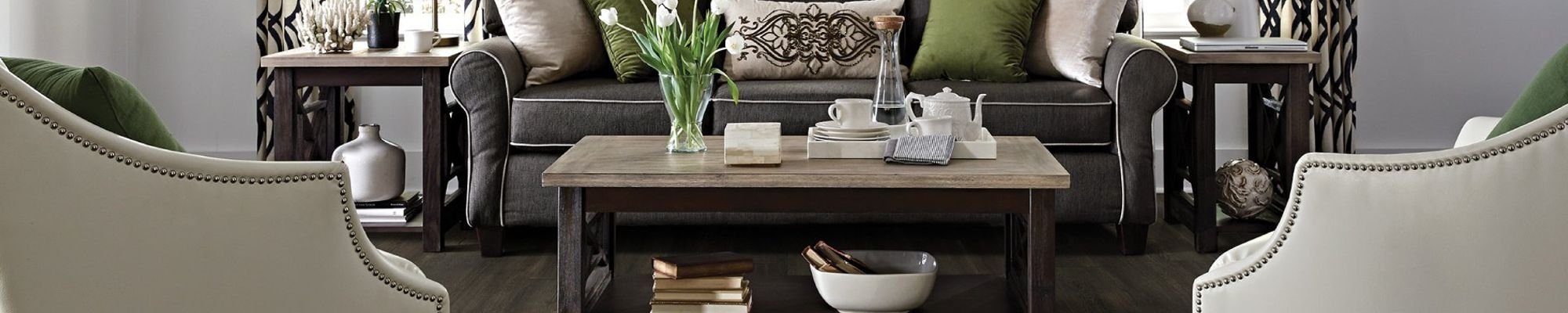 living room with wood-look luxury vinyl flooring from Carpet Design Center in the Greenville, NC area