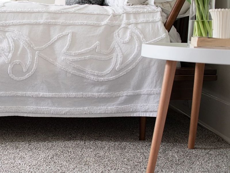 bedroom with gray carpet from Carpet Design Center in the Greenville, NC area
